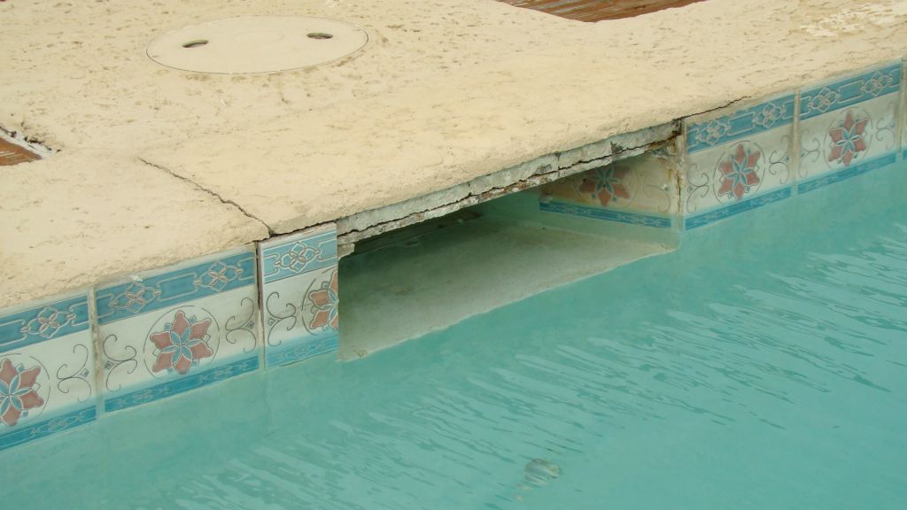 EXISTING WOOD DECK, CONCRETE STEPS and FLATWORK, HANDRAILS, BULKHEAD, STAIRS and POOL to be REPLACED